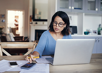 woman reviewing bills