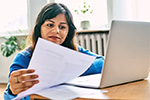 woman looking at a laptop
