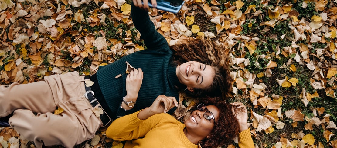 people laying in leaves people laying in leaves