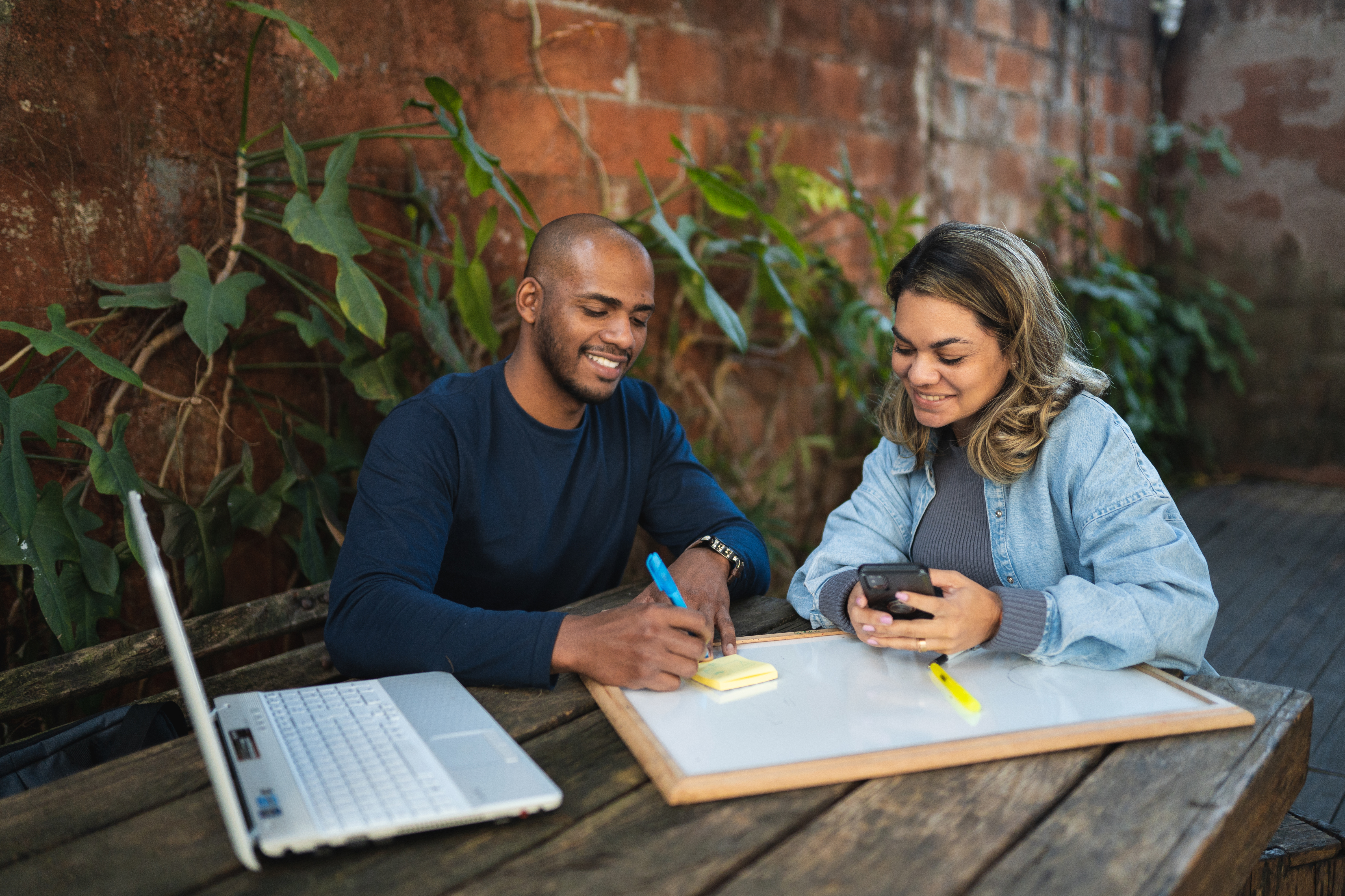 man and woman working together