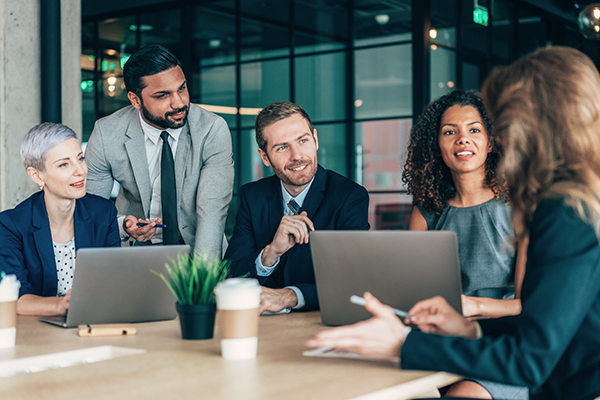 people collaborating in a board room