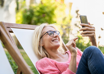 woman laughing on her phone