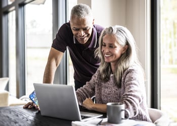 couple looking at laptop