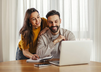 couple looking at a laptop