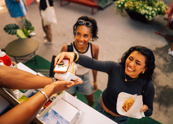 woman tapping to pay