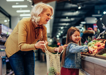 woman and child grocery shopping