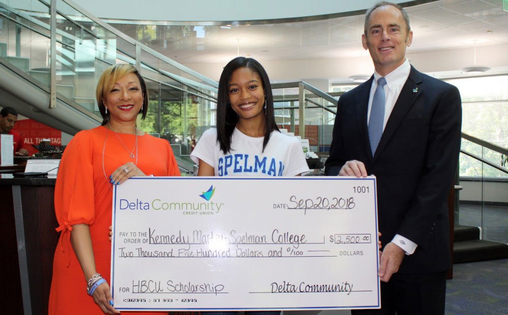 HBCU scholarship recipient receiving her check