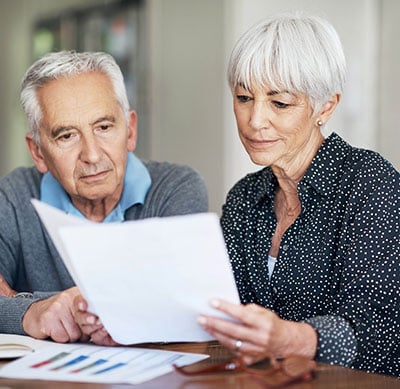 Senior Couple Looking at Finances 