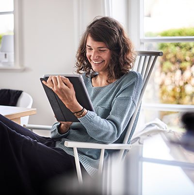 Woman looking at tablet