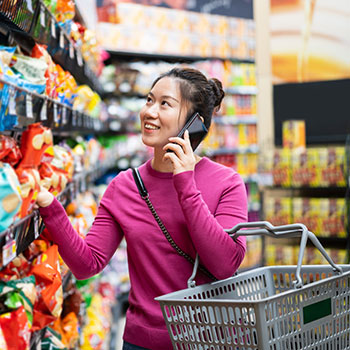 Young woman grocery shopping