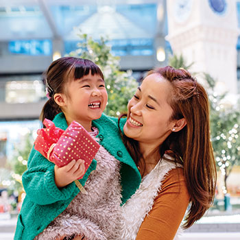 mother and daughter holiday shopping