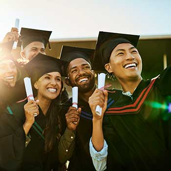 graduating students in cap and gowns