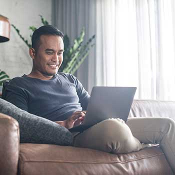 man looking at laptop