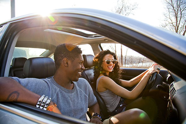 couple driving a car