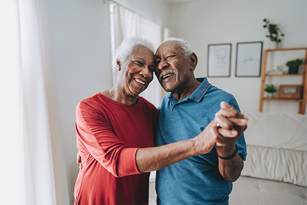 a mature couple smiling at camera